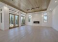 Mid-sized transitional formal and open concept light wood floor and beige floor living room photo in San Francisco with white walls, a ribbon fireplace and a tile fireplace